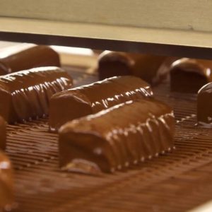 Cocoa butter equivalent for enrobing improving chocolate flow
