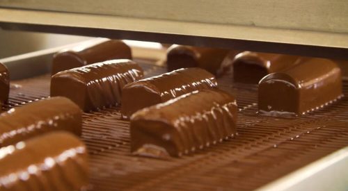 Cocoa butter equivalent for enrobing improving chocolate flow