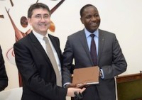 CEO P Poirrier with Minister of Agriculture M S Coulibaly