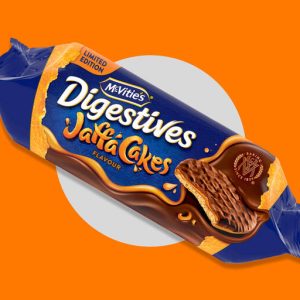 Pack of limited edition McVitie's Jaffa Cakes Digestive biscuits showing the crunchy biscuit base layered with orange jelly and dark chocolate.