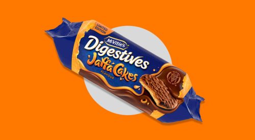 Pack of limited edition McVitie's Jaffa Cakes Digestive biscuits showing the crunchy biscuit base layered with orange jelly and dark chocolate.