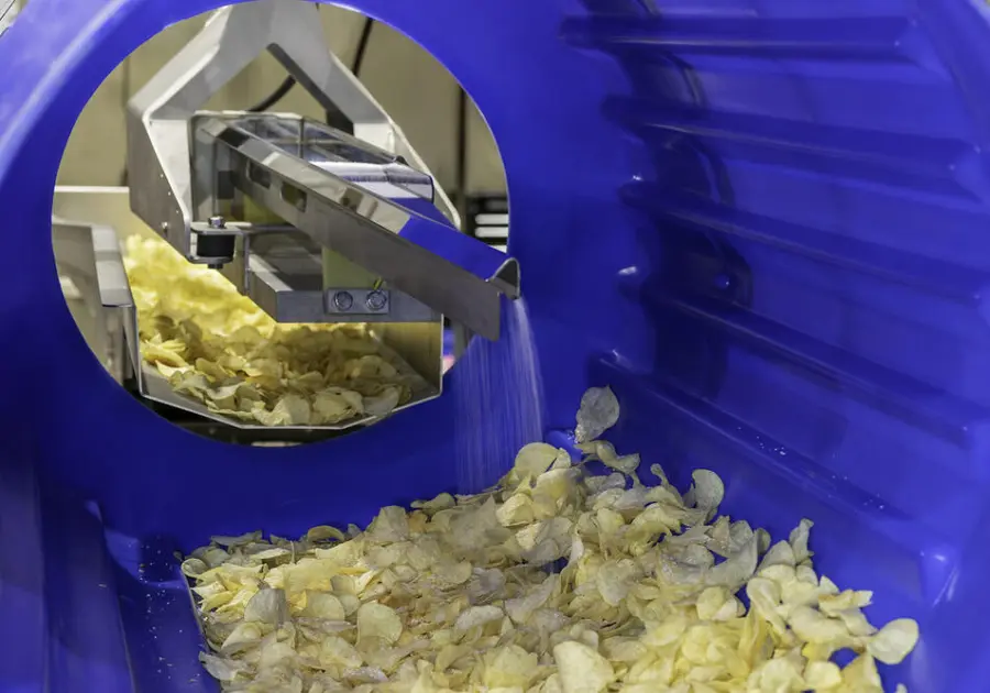 Integrated potato chip processing line using PPM fryer
