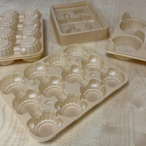 Macpac tray made from thermoformable wood‑polymer composite